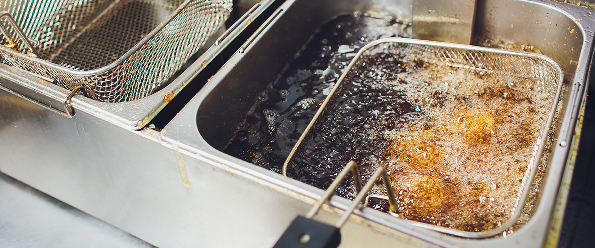 Image of a food item getting deep fried in oil